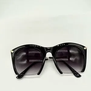 Miu Miu Black Cat Eye Cut Off Rimless Bottom Sunglasses Miu Miu MU 54YS 5AK5S0 Rimless Wraparound Black Sunglasses - US main image 4